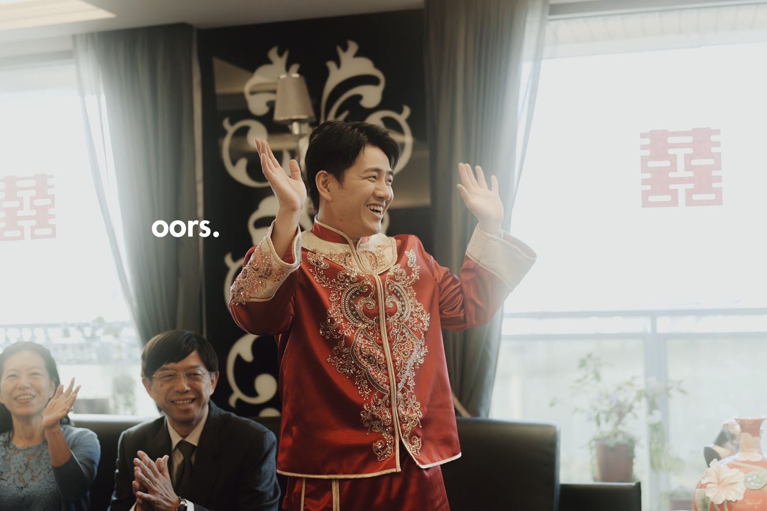 The groom greeting guests