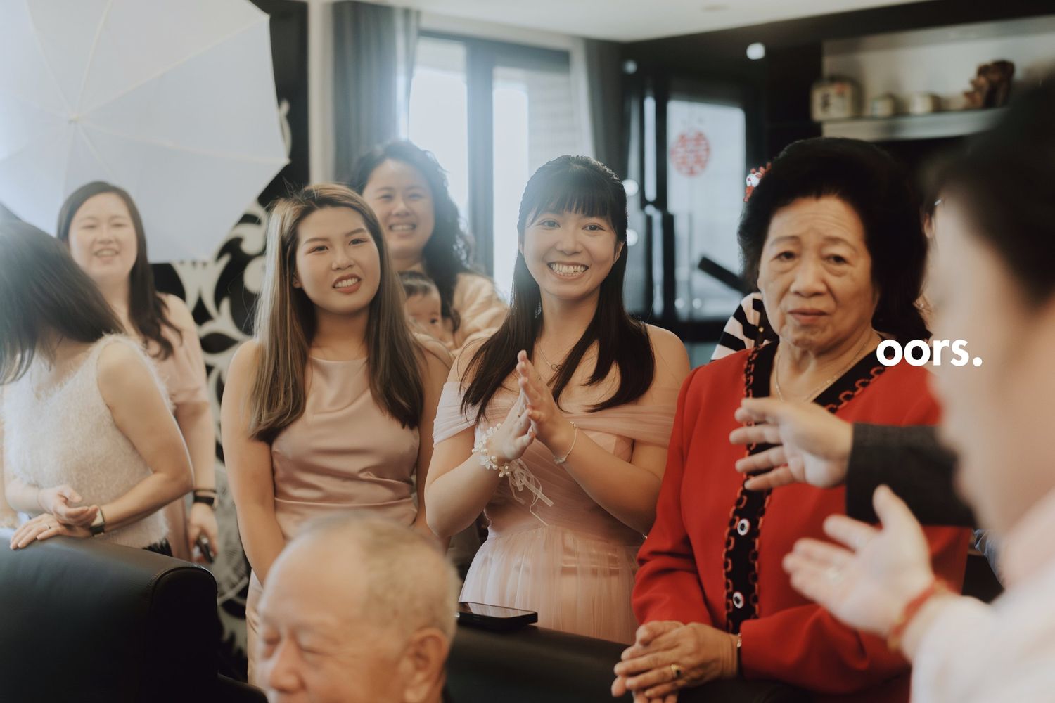 Guests smiling and clapping