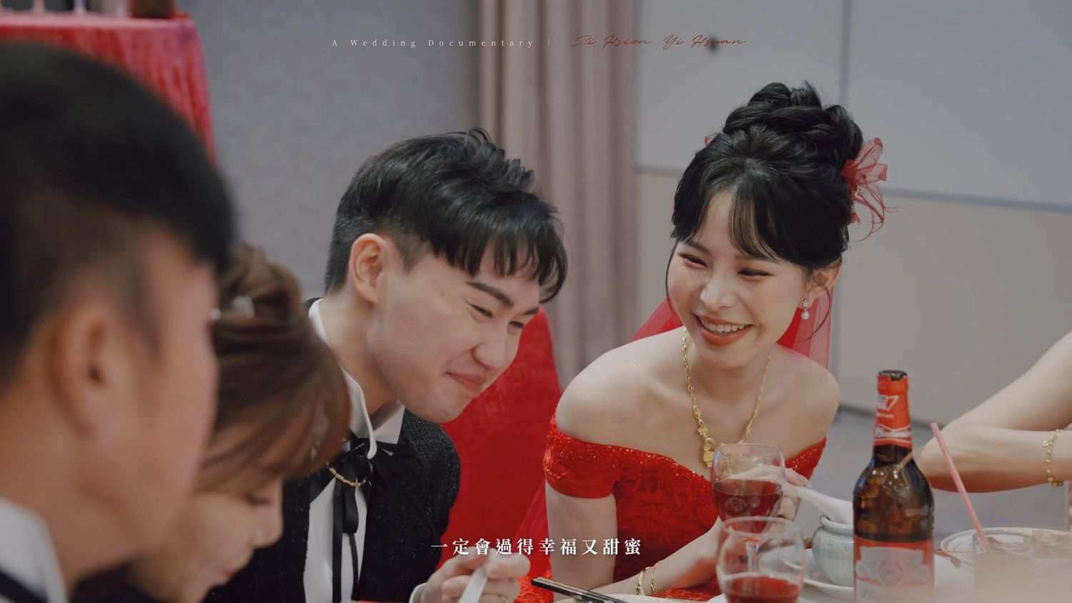 The couple sharing a laugh at the table