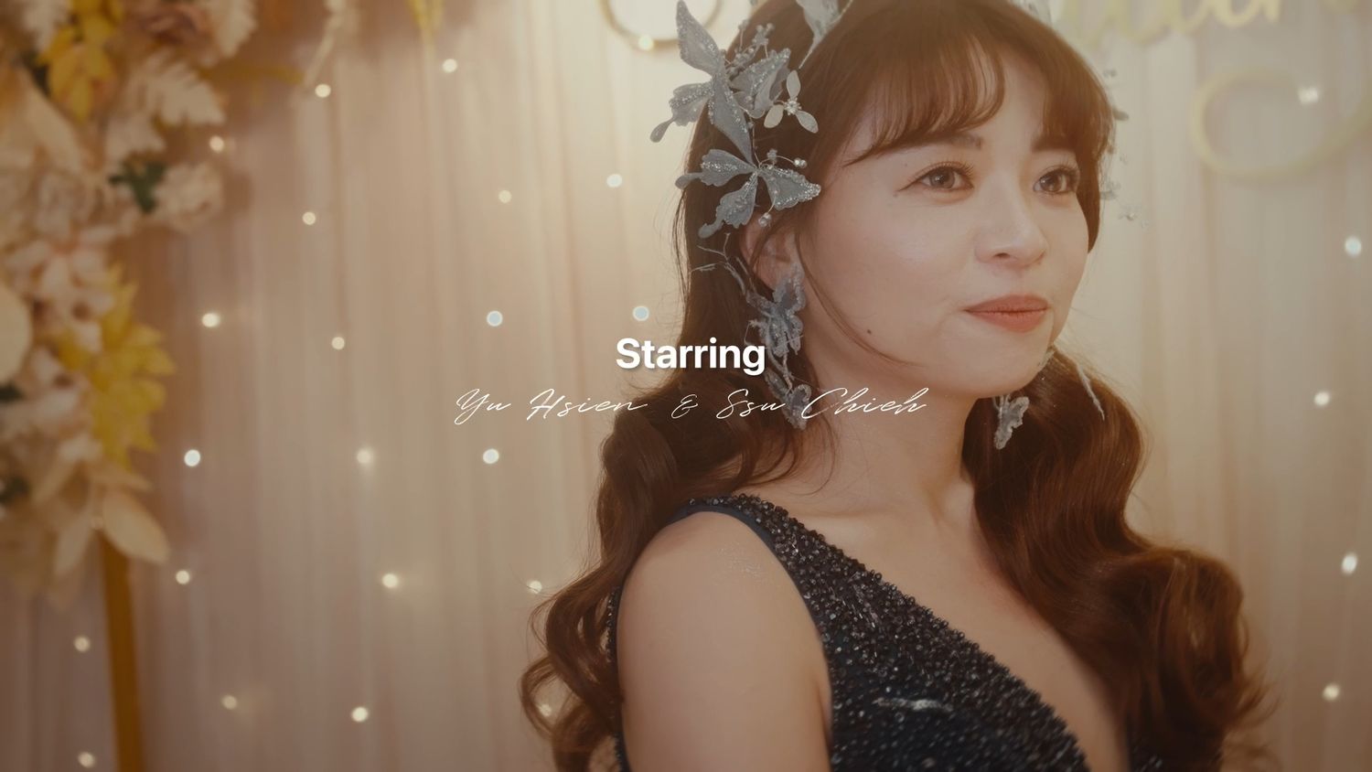 The bride in a butterfly hairpiece, smiling softly